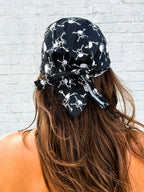 Black bandana skull cap with white skull-and-crossbones print – view 3