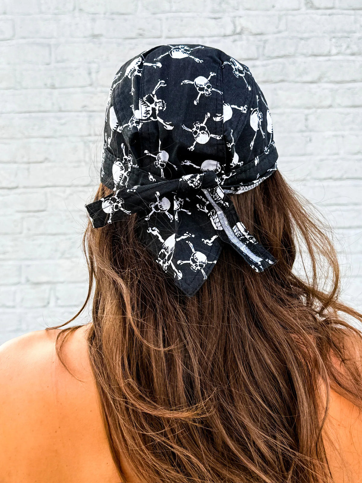Black bandana skull cap with white skull-and-crossbones print – view 3
